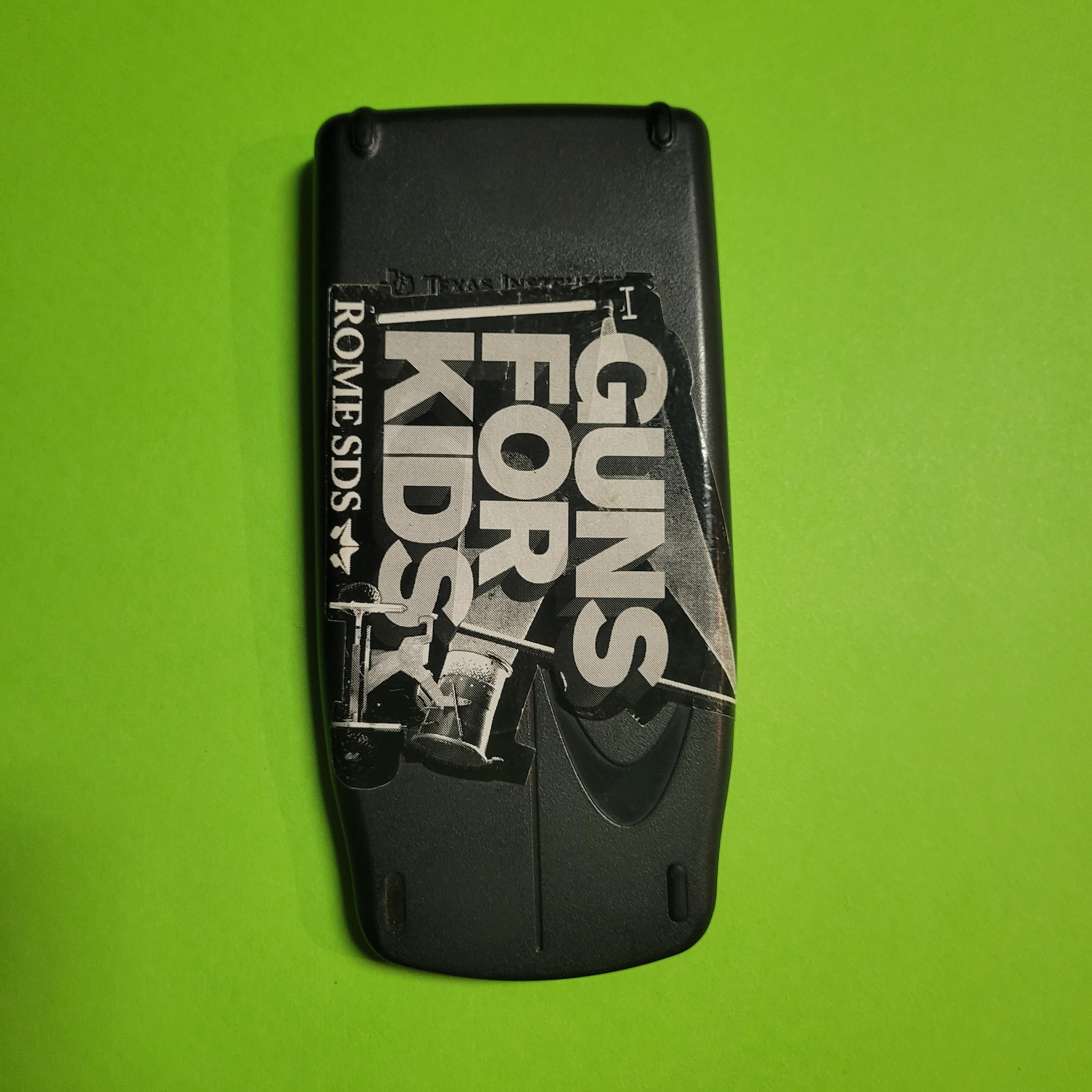 An image of the case of a texas instruments ti83 plus graphing calculator